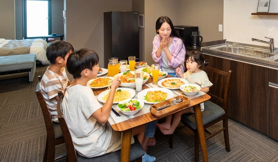 image of eating a meal with family